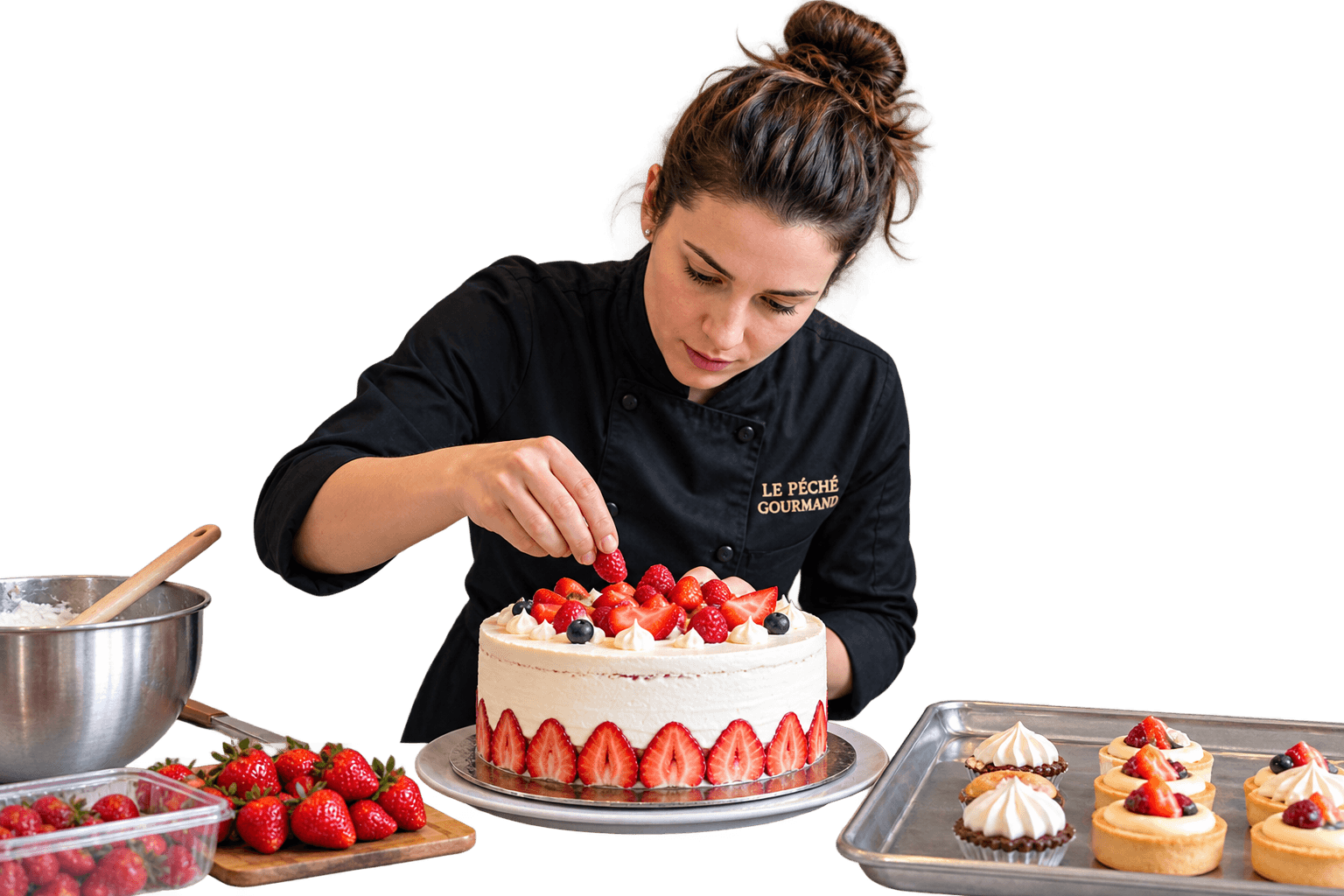Our head baker decorating a fresh strawberry cake